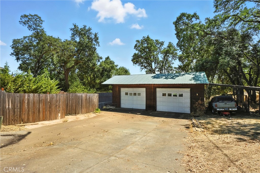 3171 Springe Street Nice, CA 95464 - Photo 20 of 28 a view of a car park next to a yard