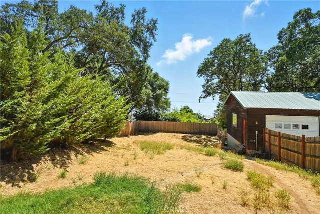 a view of a yard covered in snow