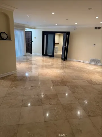 a view of a livingroom with a staircase