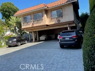 a car parked in front of a house