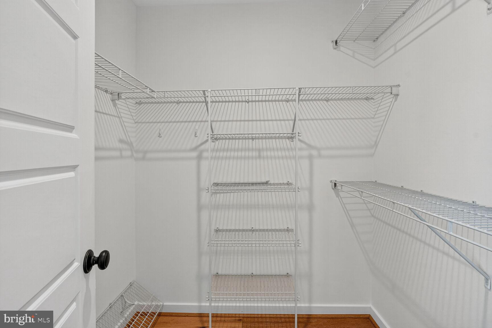2373 Wyeth Street Silver Spring, MD 20906 - Photo 16 of 32 a view of walk in closet with empty racks