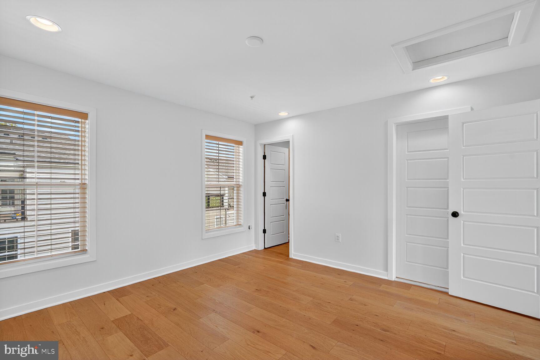 2373 Wyeth Street Silver Spring, MD 20906 - Photo 27 of 32 a view of empty room with wooden floor and fan