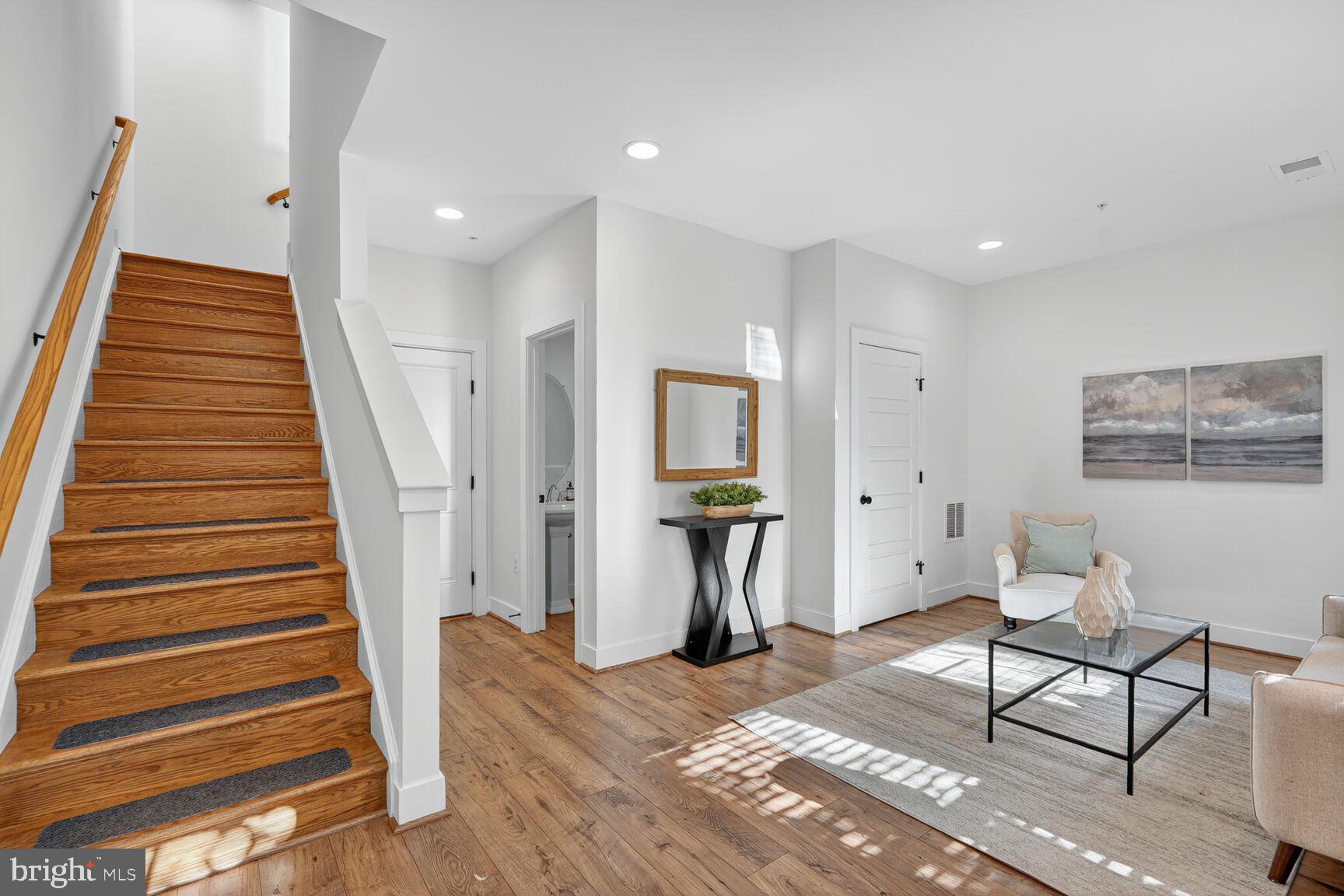 2373 Wyeth Street Silver Spring, MD 20906 - Photo 4 of 32 a view of a livingroom with furniture and staircase