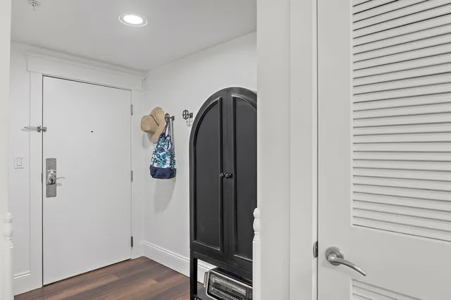 a view of a livingroom with wooden floor