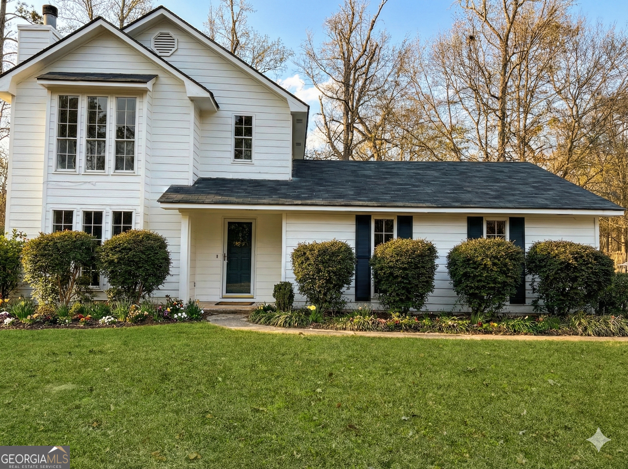 411 Fawnbrook Circle Griffin, GA 30223 - Photo 1 of 1 a front view of a house with a yard