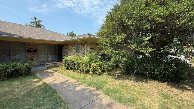 a view of house with outdoor space