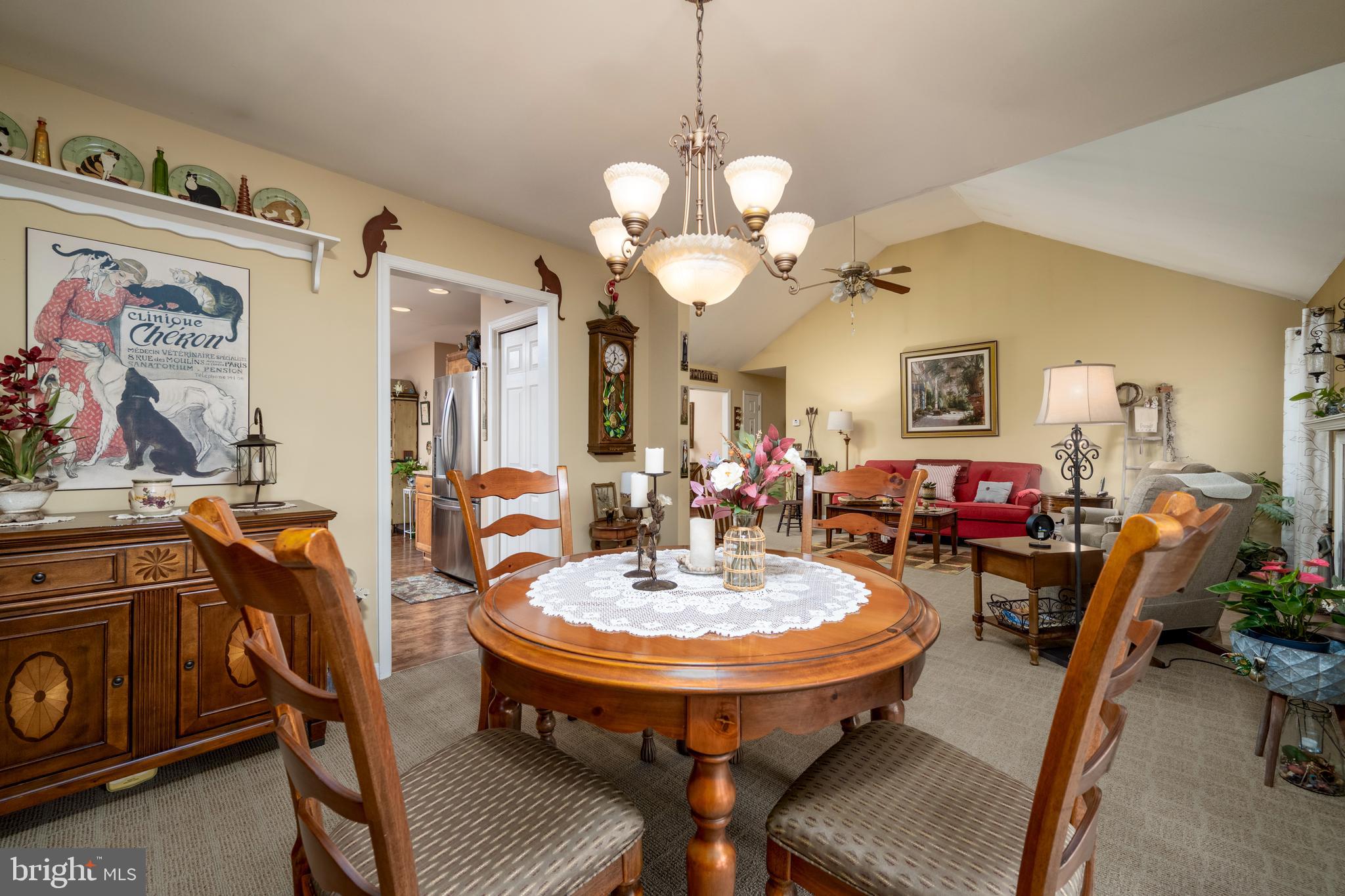 65 Susannah Drive Magnolia, DE 19962 - Photo 12 of 31 a view of a dining room with furniture and a chandelier