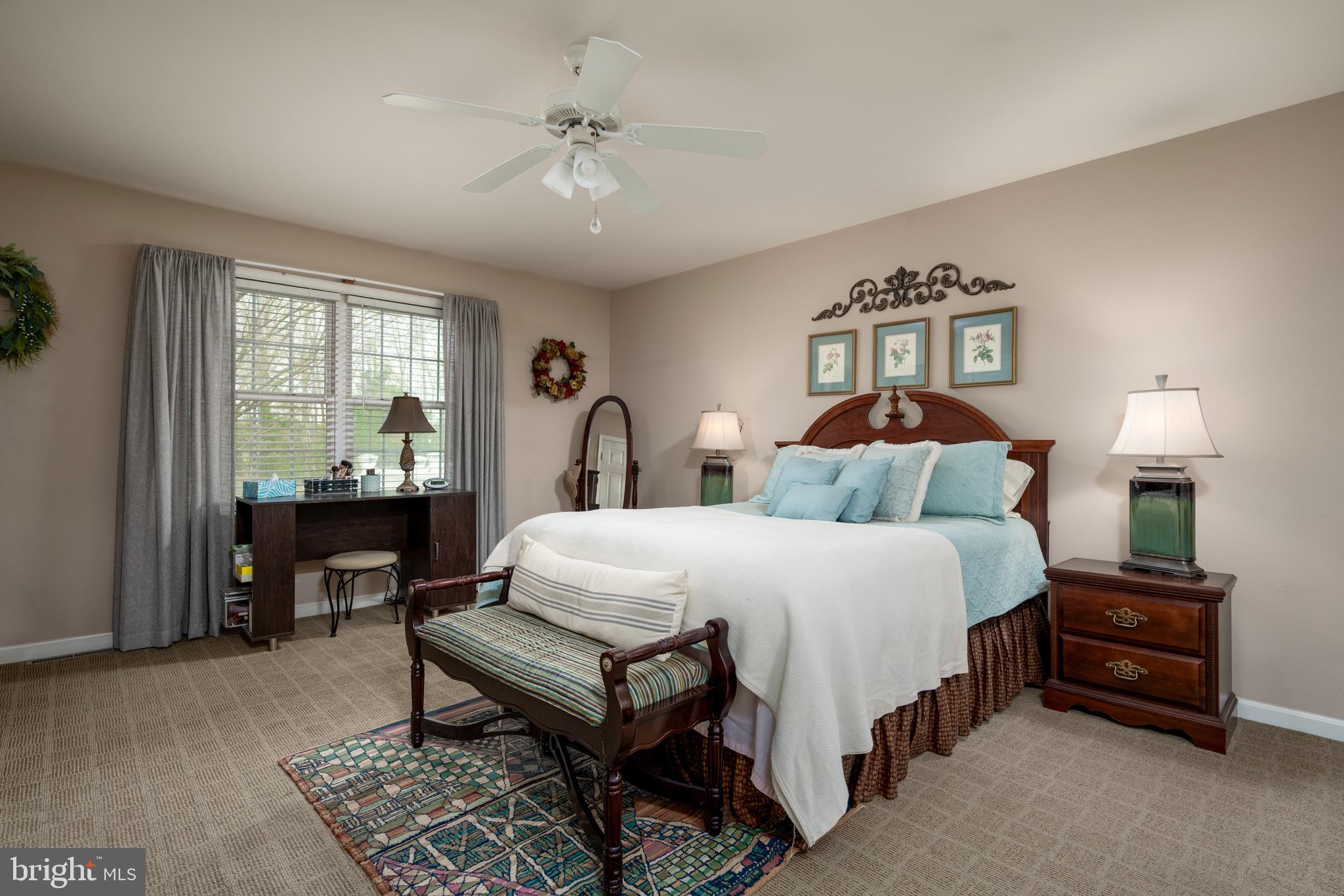 65 Susannah Drive Magnolia, DE 19962 - Photo 15 of 31 a bedroom with a bed a couch and dresser