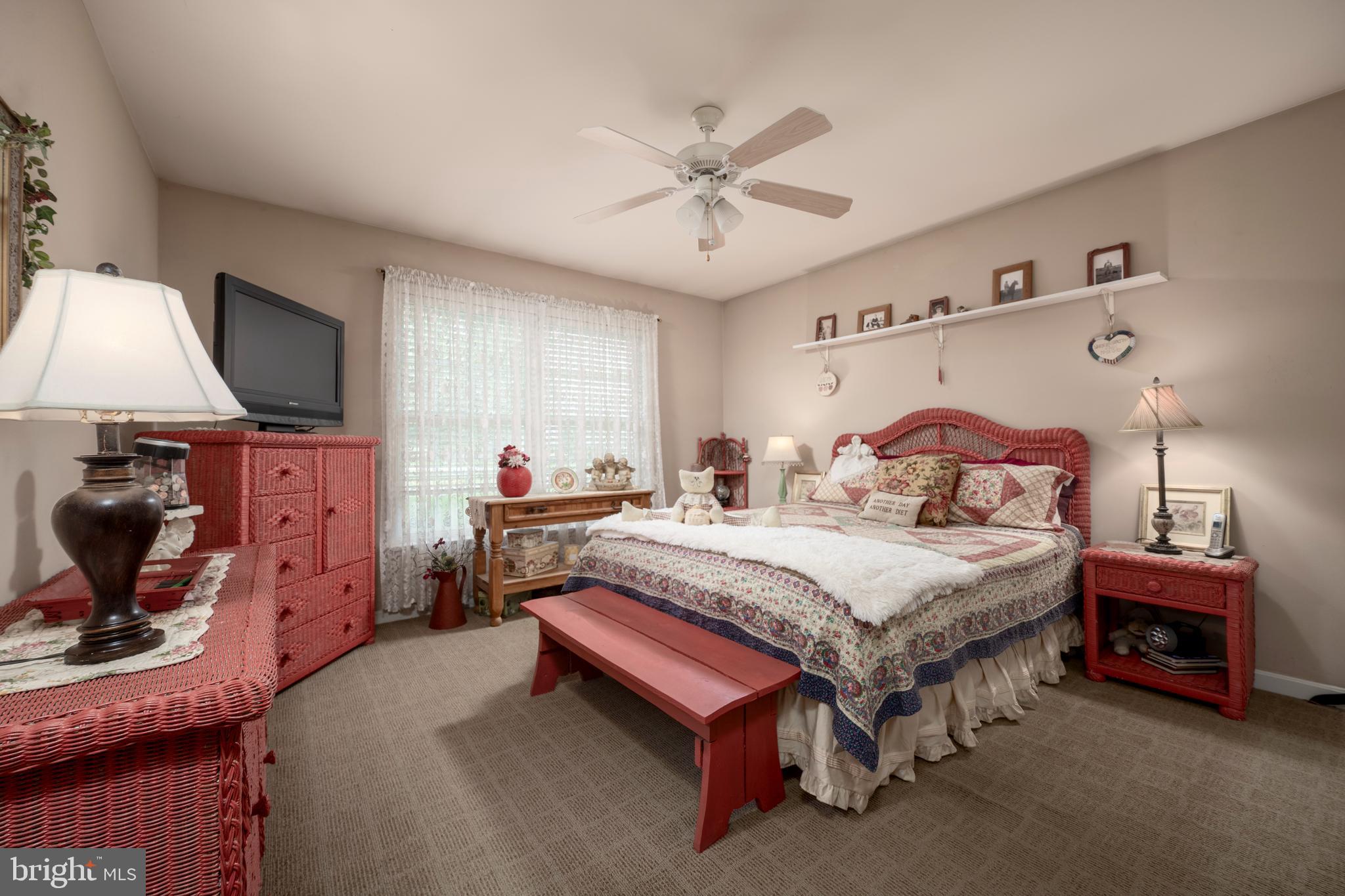 65 Susannah Drive Magnolia, DE 19962 - Photo 18 of 31 a bed room with a bed and a chair