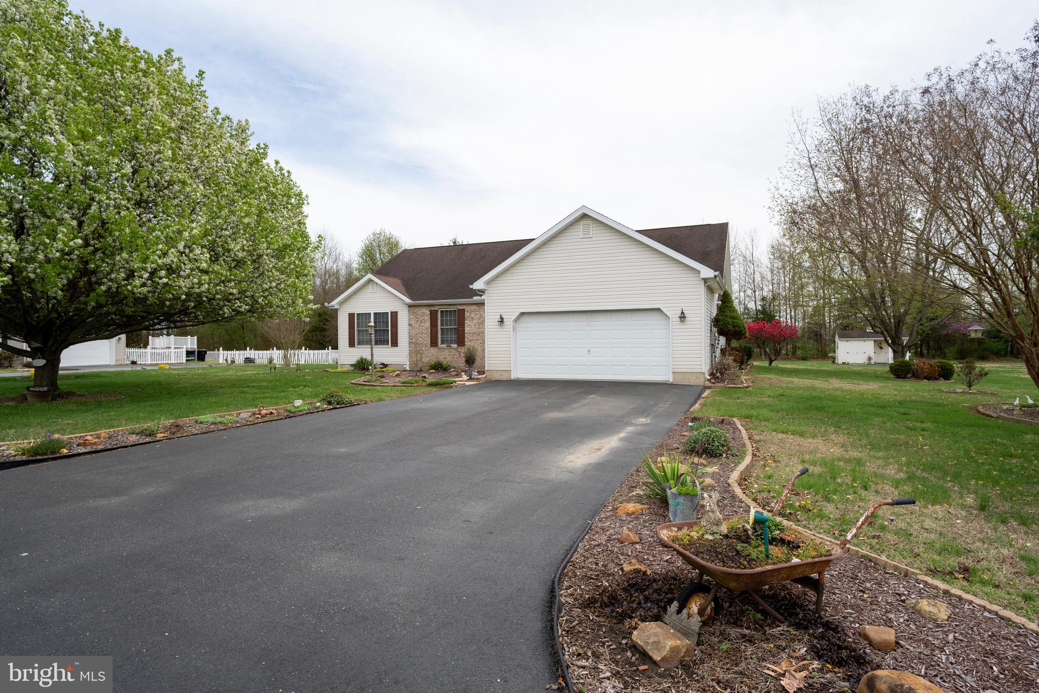 65 Susannah Drive Magnolia, DE 19962 - Photo 2 of 31 a front view of a house with a yard
