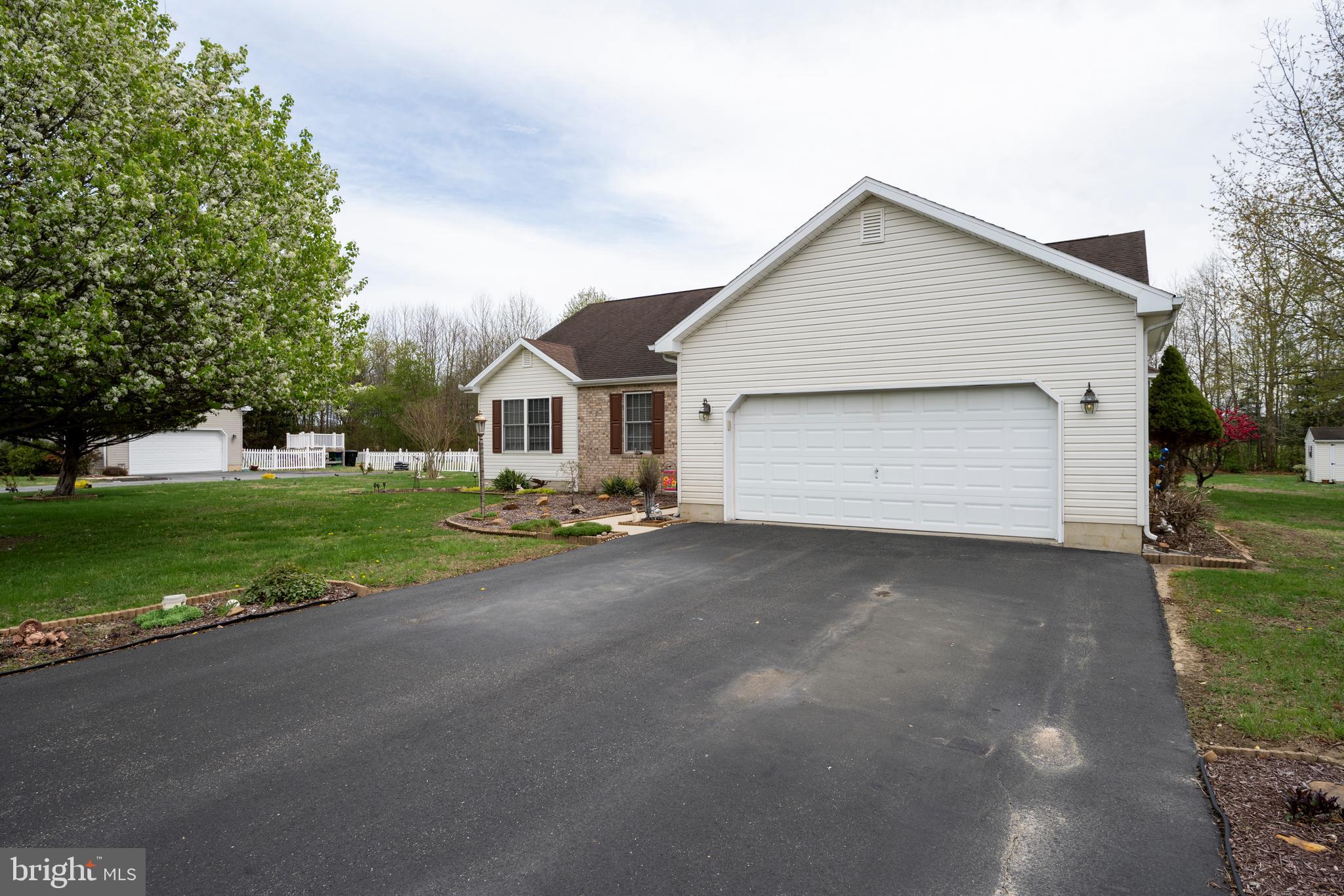 65 Susannah Drive Magnolia, DE 19962 - Photo 3 of 31 a view of a house with backyard and trees
