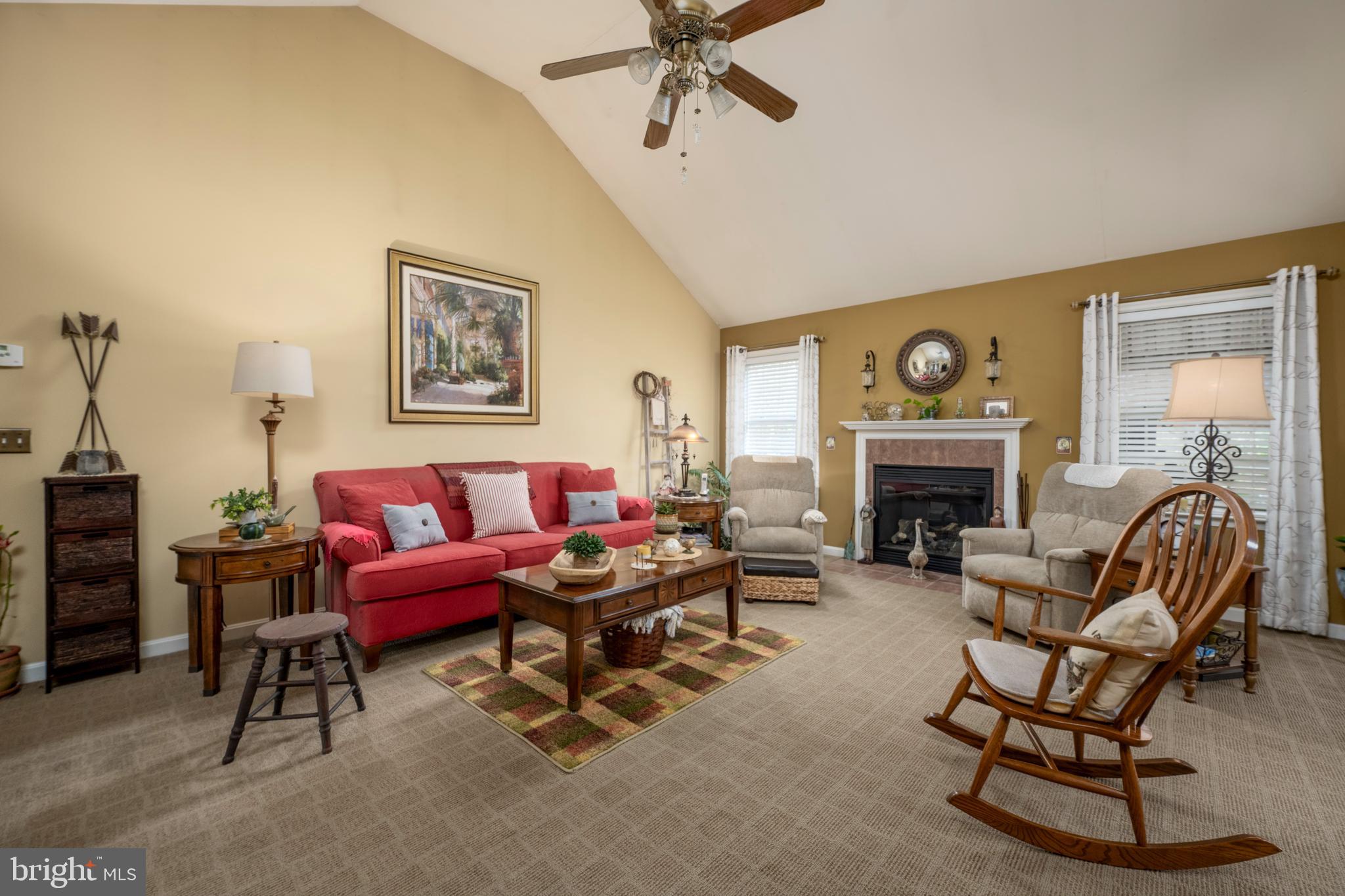 65 Susannah Drive Magnolia, DE 19962 - Photo 5 of 31 a living room with furniture and a fireplace