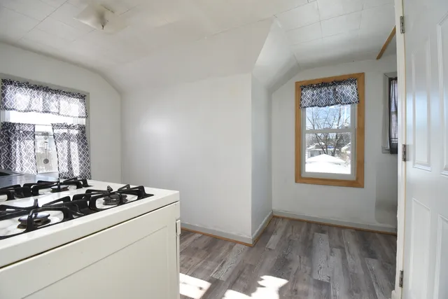 a room with storage and window