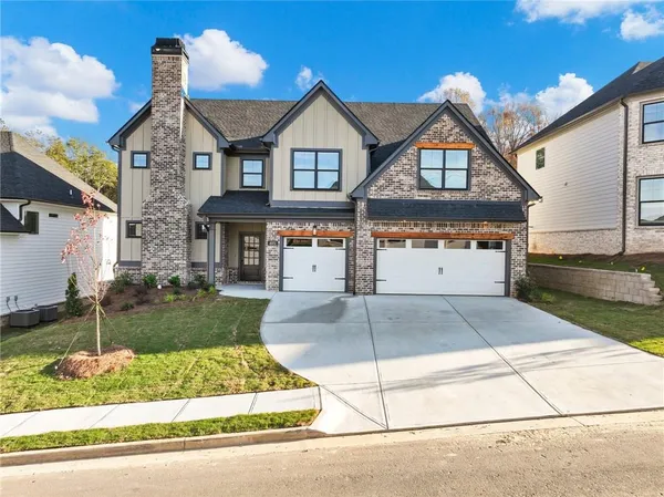 front view of a house with a yard