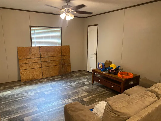 a bed room with a bed and a window