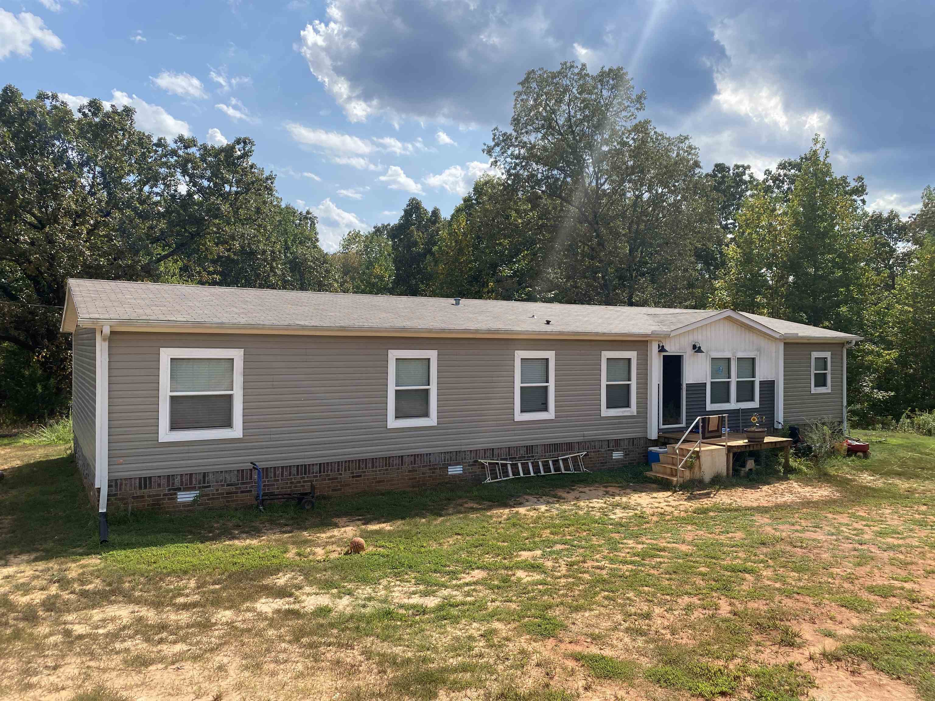 525 Sewell Bottom Road Adamsville, TN 38310 - Photo 3 of 37 a backyard of a house