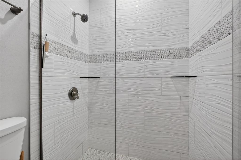 3633 Main Street Sanford, FL 32771 - Photo 19 of 31 a bathroom with a shower