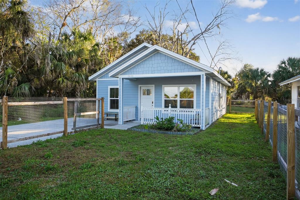 3633 Main Street Sanford, FL 32771 - Photo 22 of 31 a view of a house with a yard