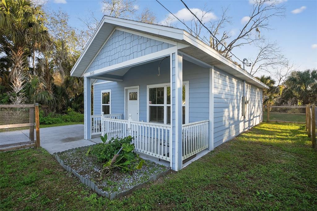 3633 Main Street Sanford, FL 32771 - Photo 25 of 31 a view of a house with a yard and plants