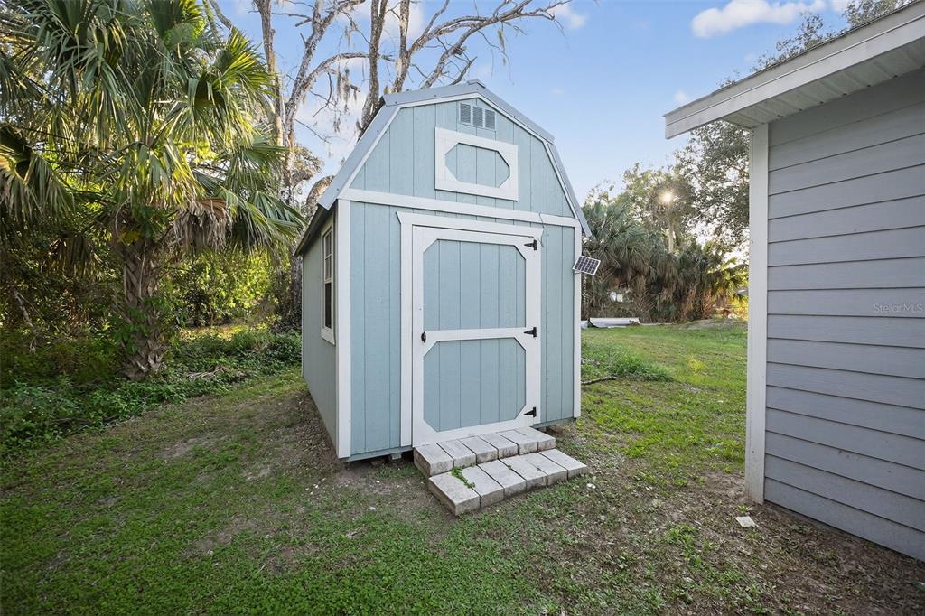 3633 Main Street Sanford, FL 32771 - Photo 26 of 31 a view of a house with a small yard