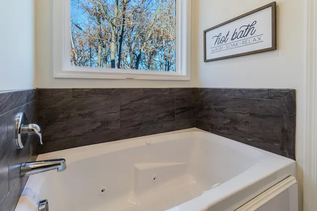 a bathroom with a bathtub