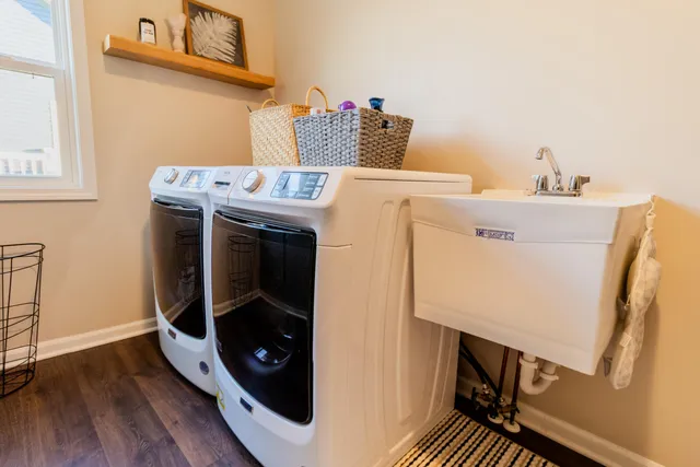 a utility room with dryer and washer