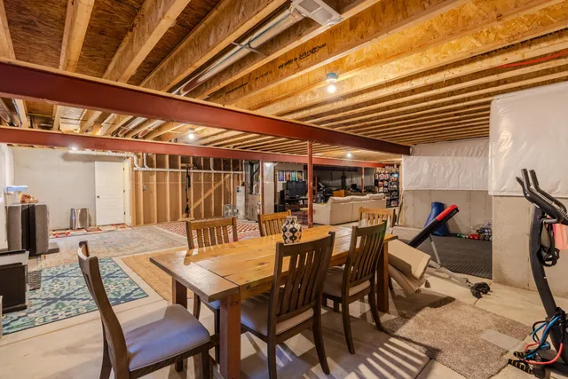 a view of a dinning table and chairs in the patio