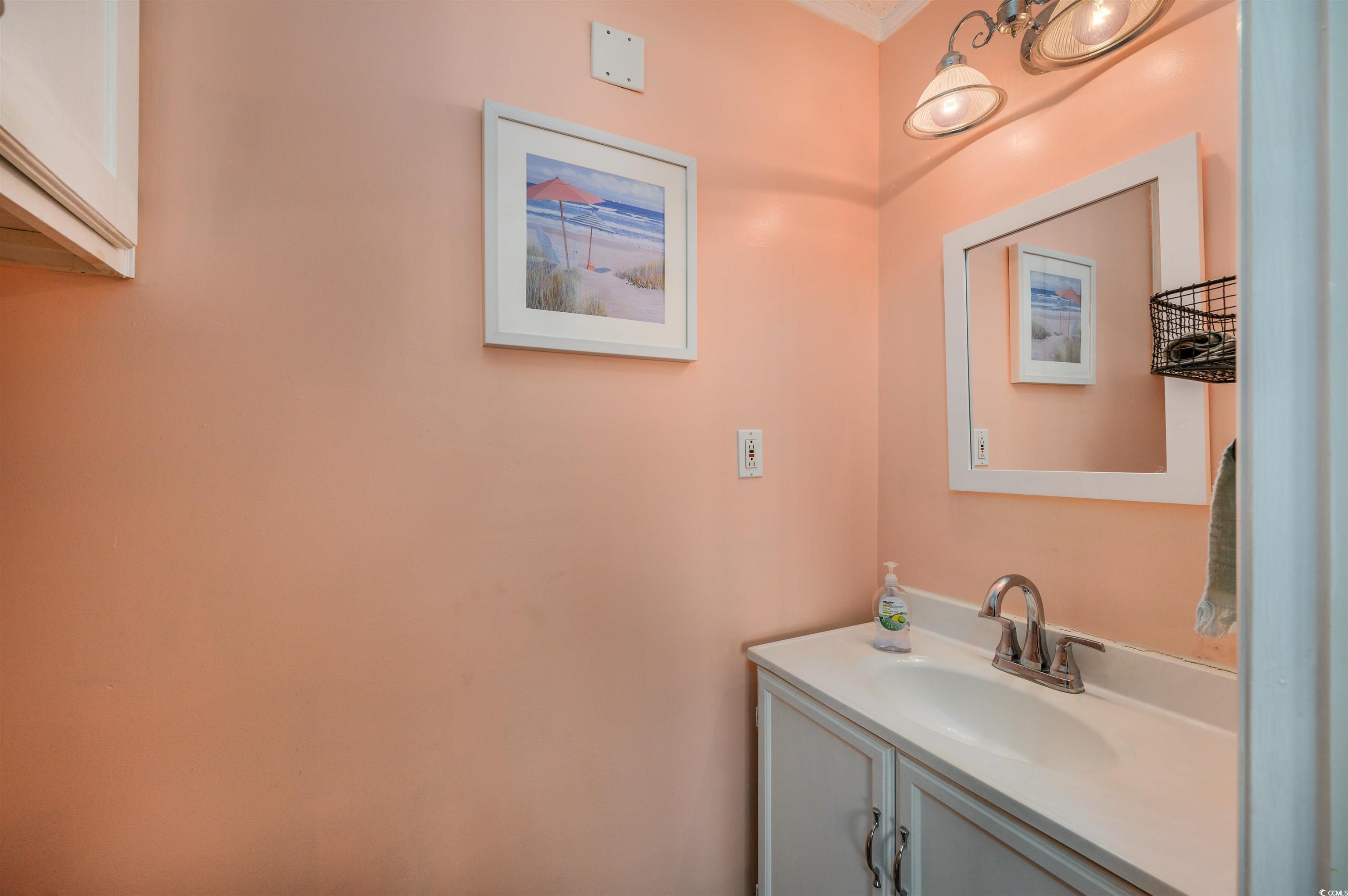 1919 Spring Street, Unit B14 North Myrtle Beach, SC 29582 - Photo 15 of 25 Bathroom featuring vanity