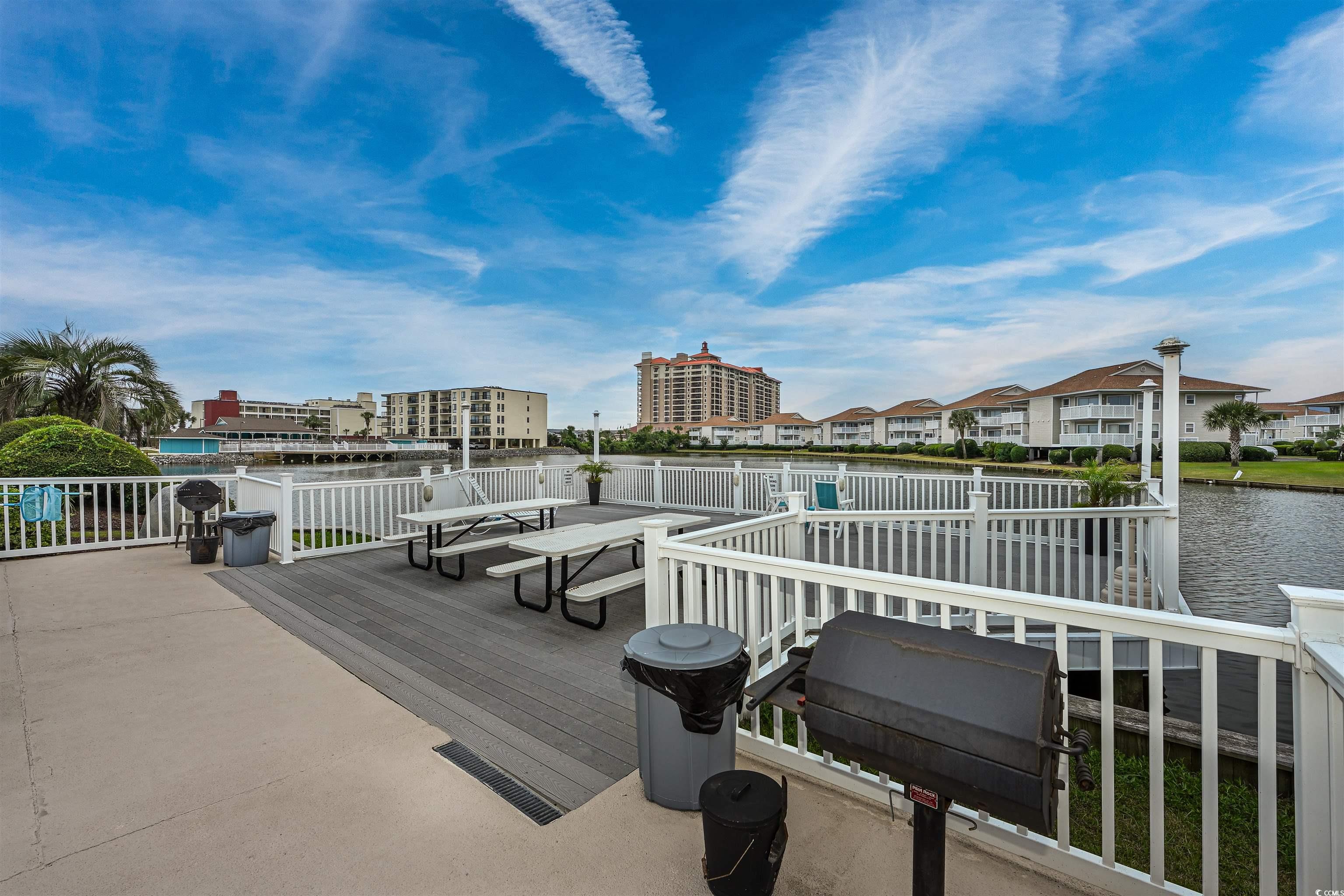 1919 Spring Street, Unit B14 North Myrtle Beach, SC 29582 - Photo 23 of 25 View of dock featuring a water view