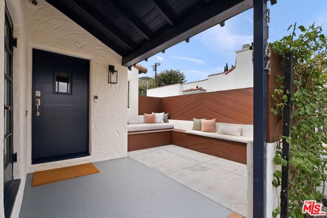a view of balcony with a potted plant