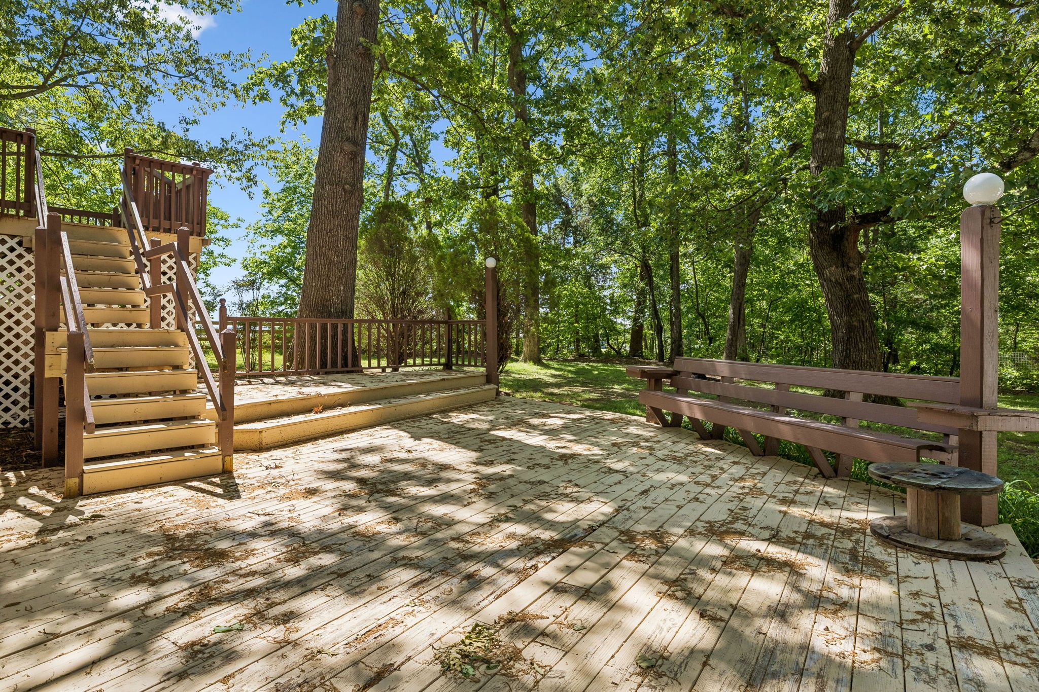 385 Perdue Road Franklin, KY 42134 - Photo 16 of 72 a backyard of a house with lots of green space and wooden fence