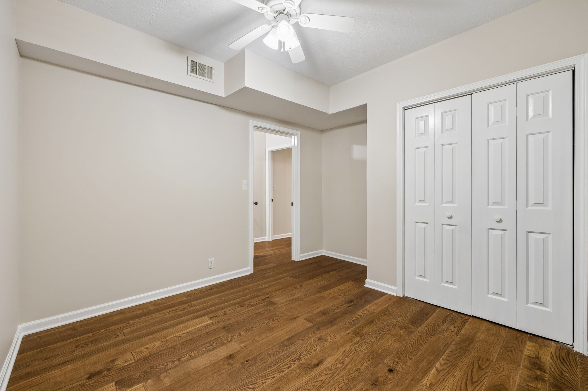 385 Perdue Road Franklin, KY 42134 - Photo 33 of 72 a view of an empty room with wooden floor