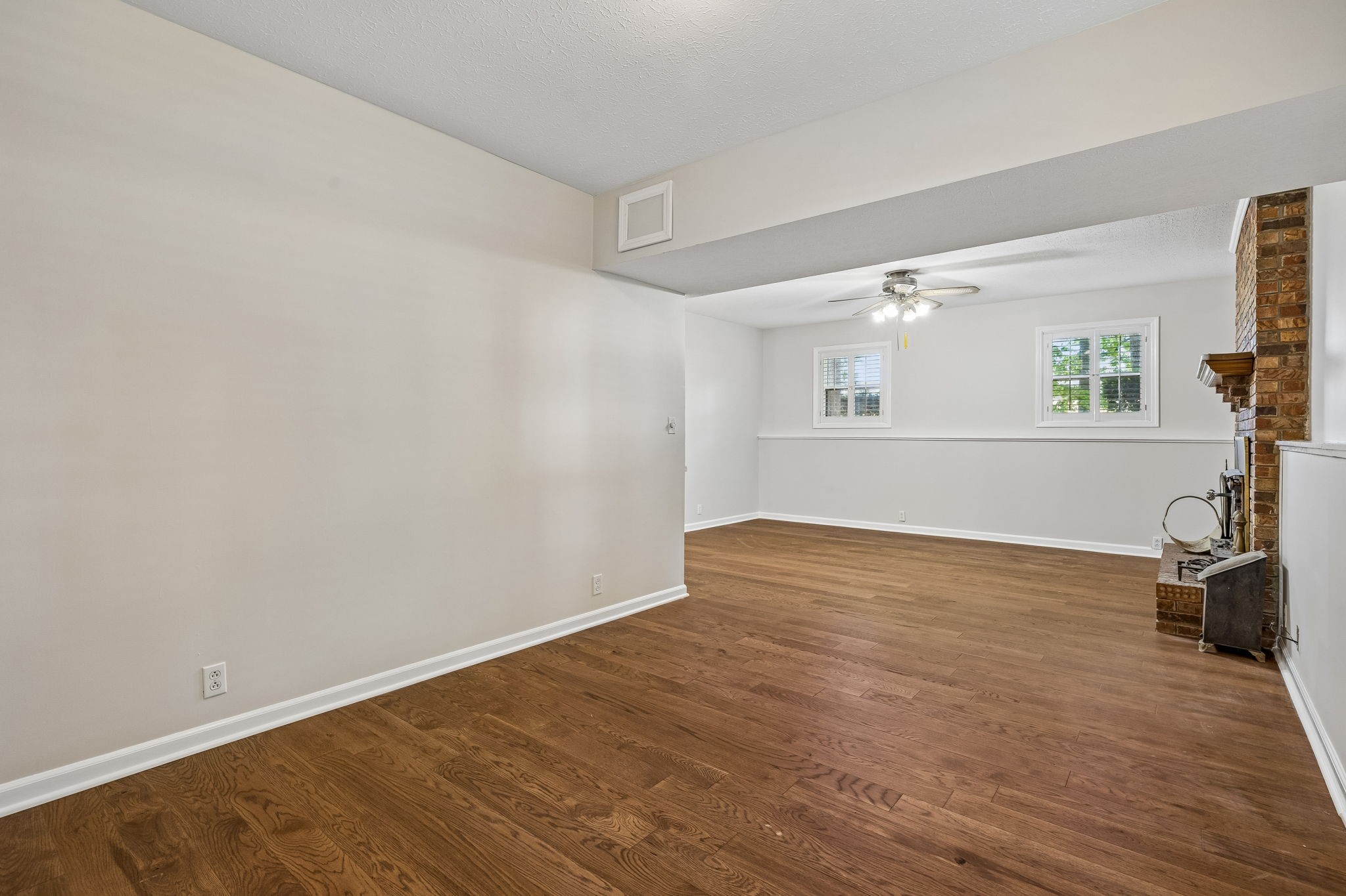 385 Perdue Road Franklin, KY 42134 - Photo 43 of 72 a view of empty room with wooden floor and fan