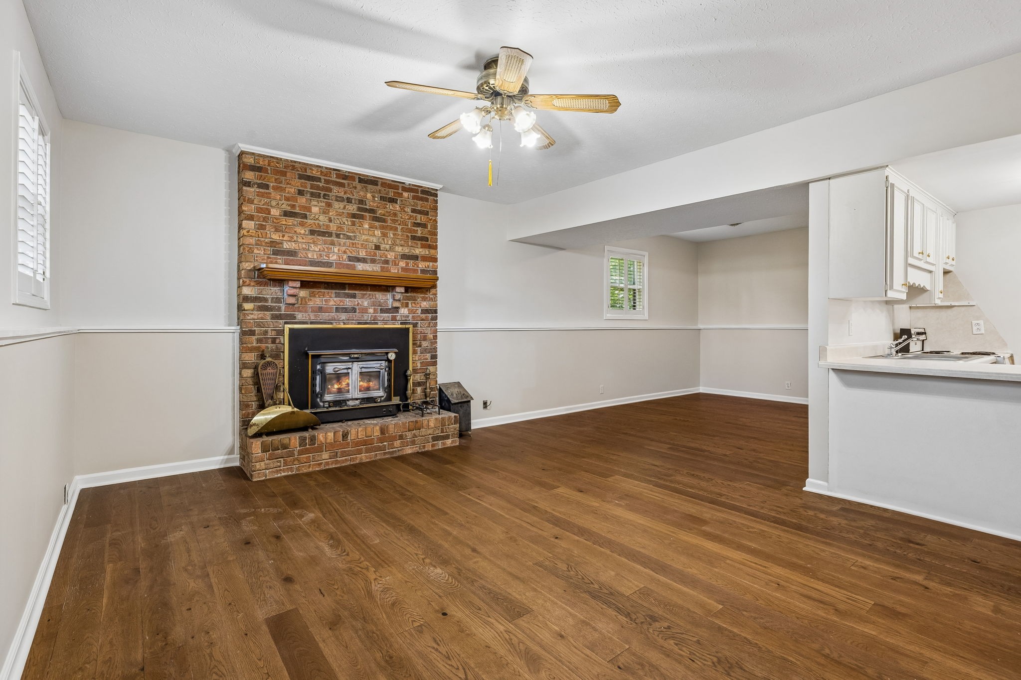 385 Perdue Road Franklin, KY 42134 - Photo 46 of 72 an empty room with windows and fireplace