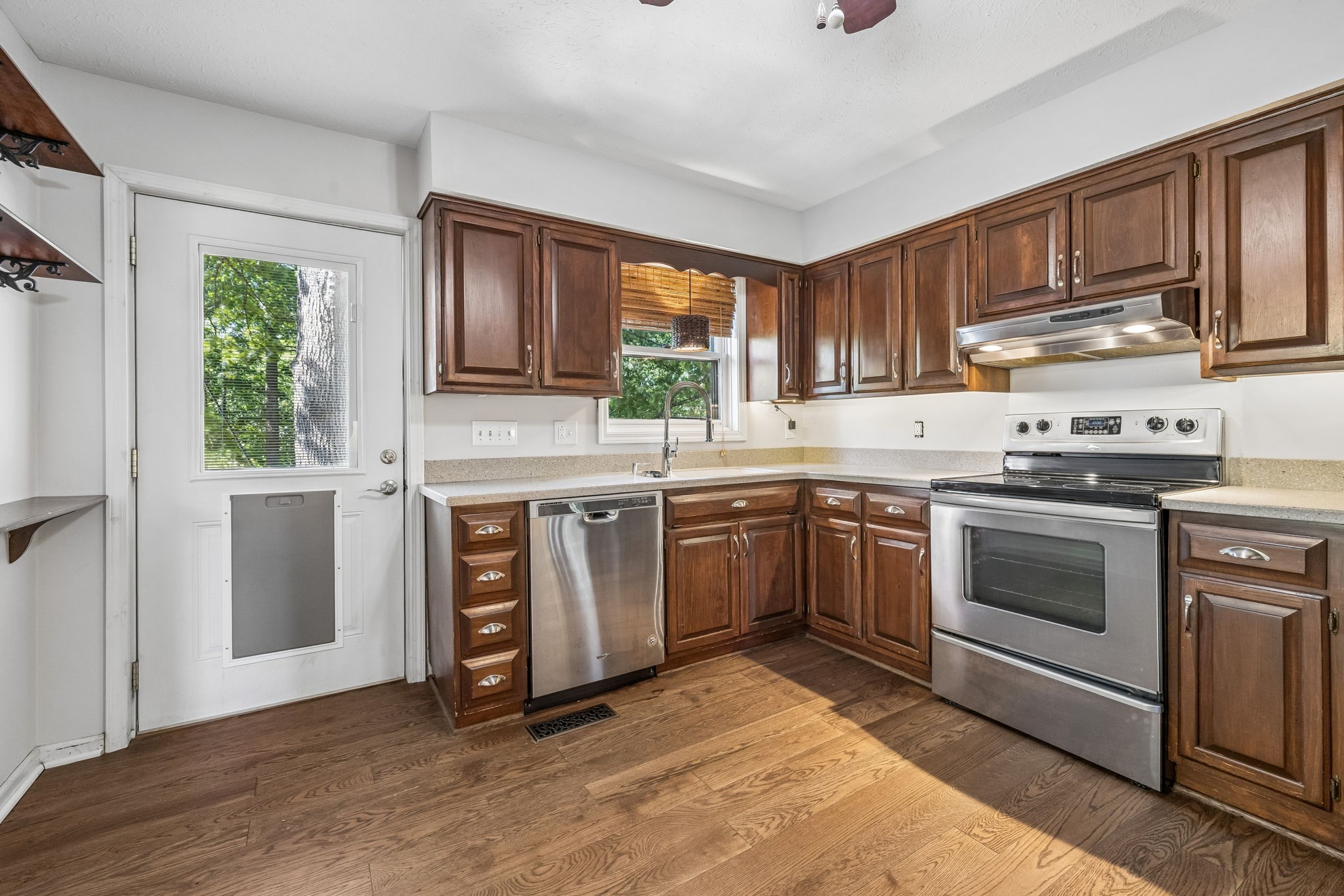 385 Perdue Road Franklin, KY 42134 - Photo 61 of 72 a kitchen with stainless steel appliances a stove a sink and a microwave