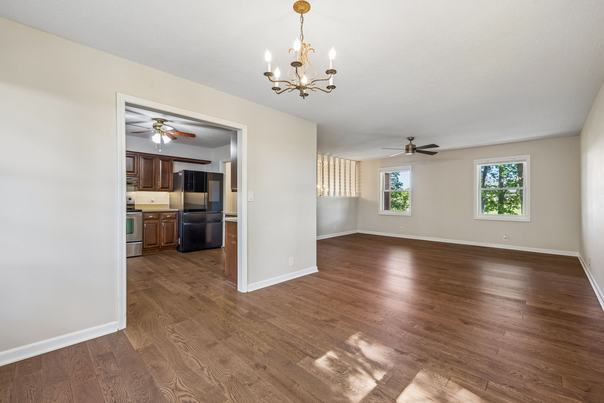 385 Perdue Road Franklin, KY 42134 - Photo 66 of 72 wooden floor in an empty room with a window