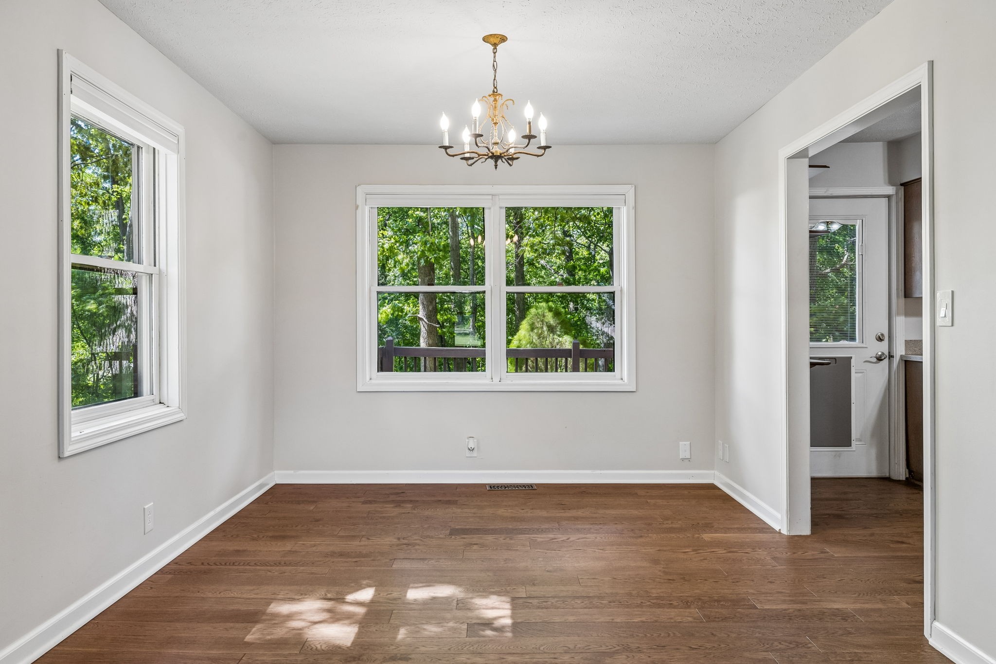 385 Perdue Road Franklin, KY 42134 - Photo 68 of 72 a view of an empty room with wooden floor and a window