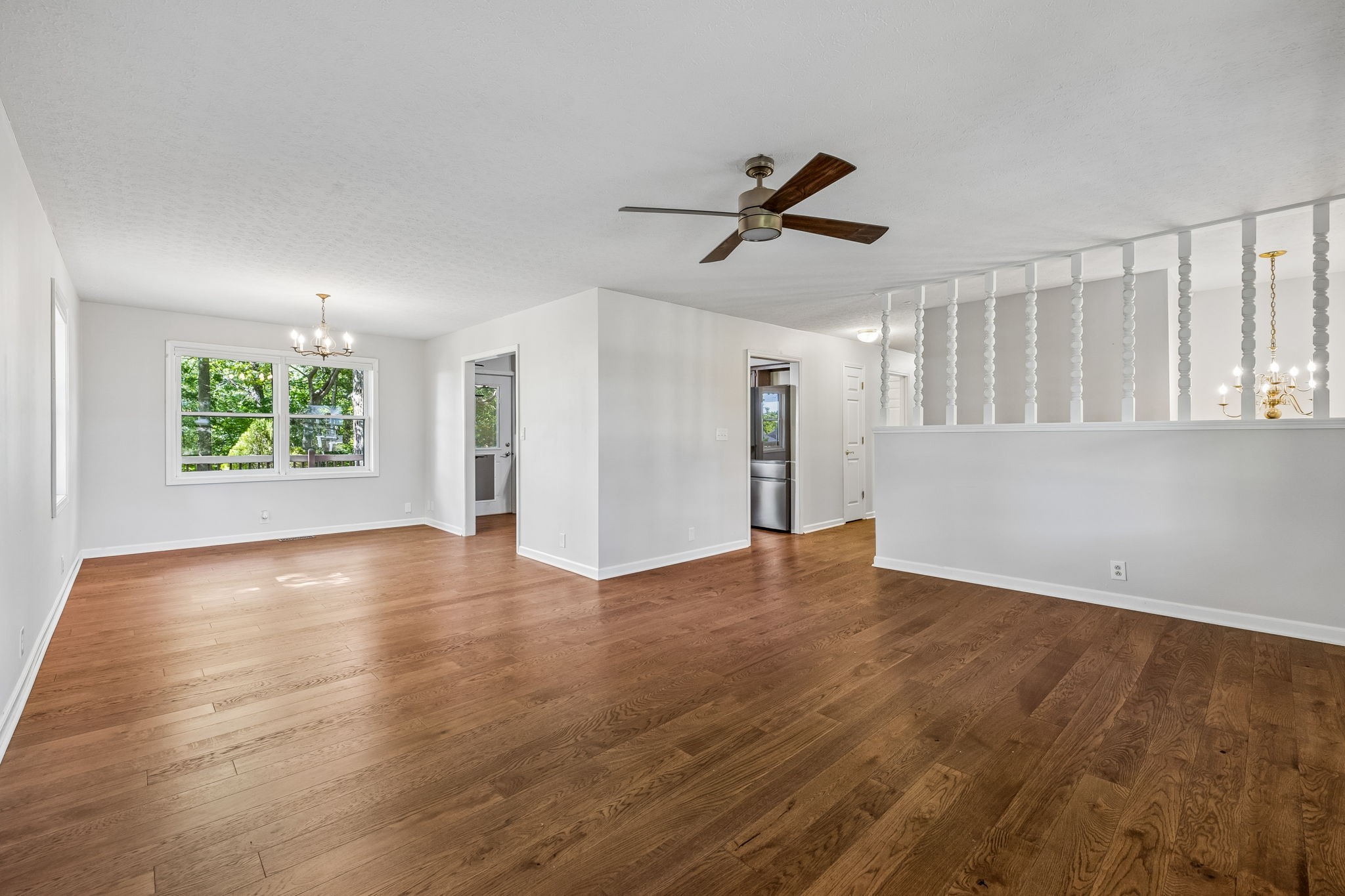 385 Perdue Road Franklin, KY 42134 - Photo 70 of 72 a view of empty room with wooden floor and windows