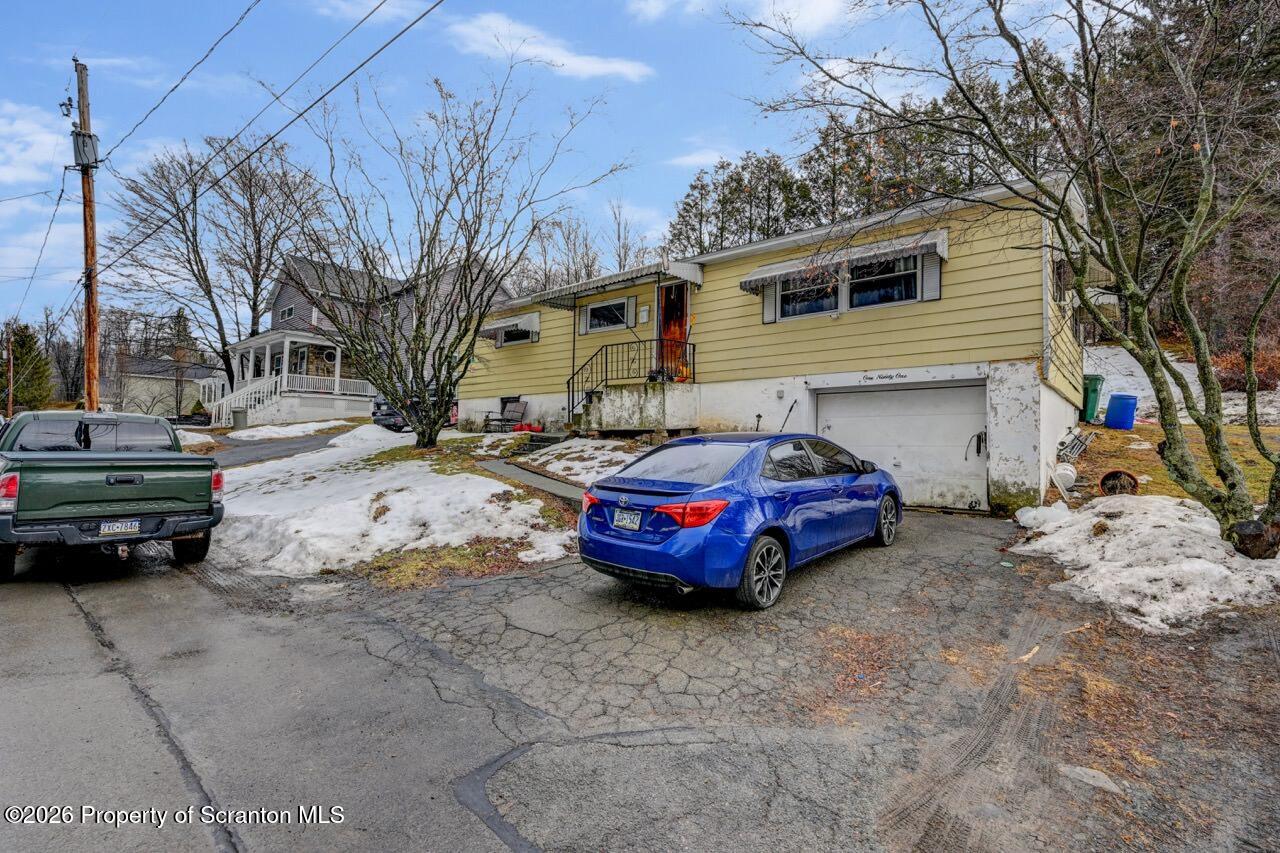 191 Poplar Street Archbald, PA 18403 - Photo 1 of 35 a front view of a house with a yard