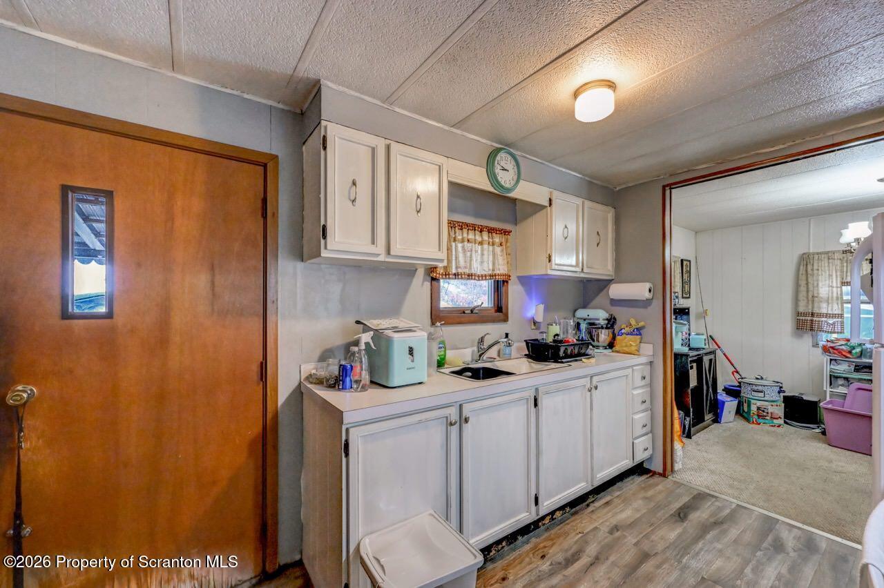191 Poplar Street Archbald, PA 18403 - Photo 19 of 35 a kitchen with a sink cabinets and window
