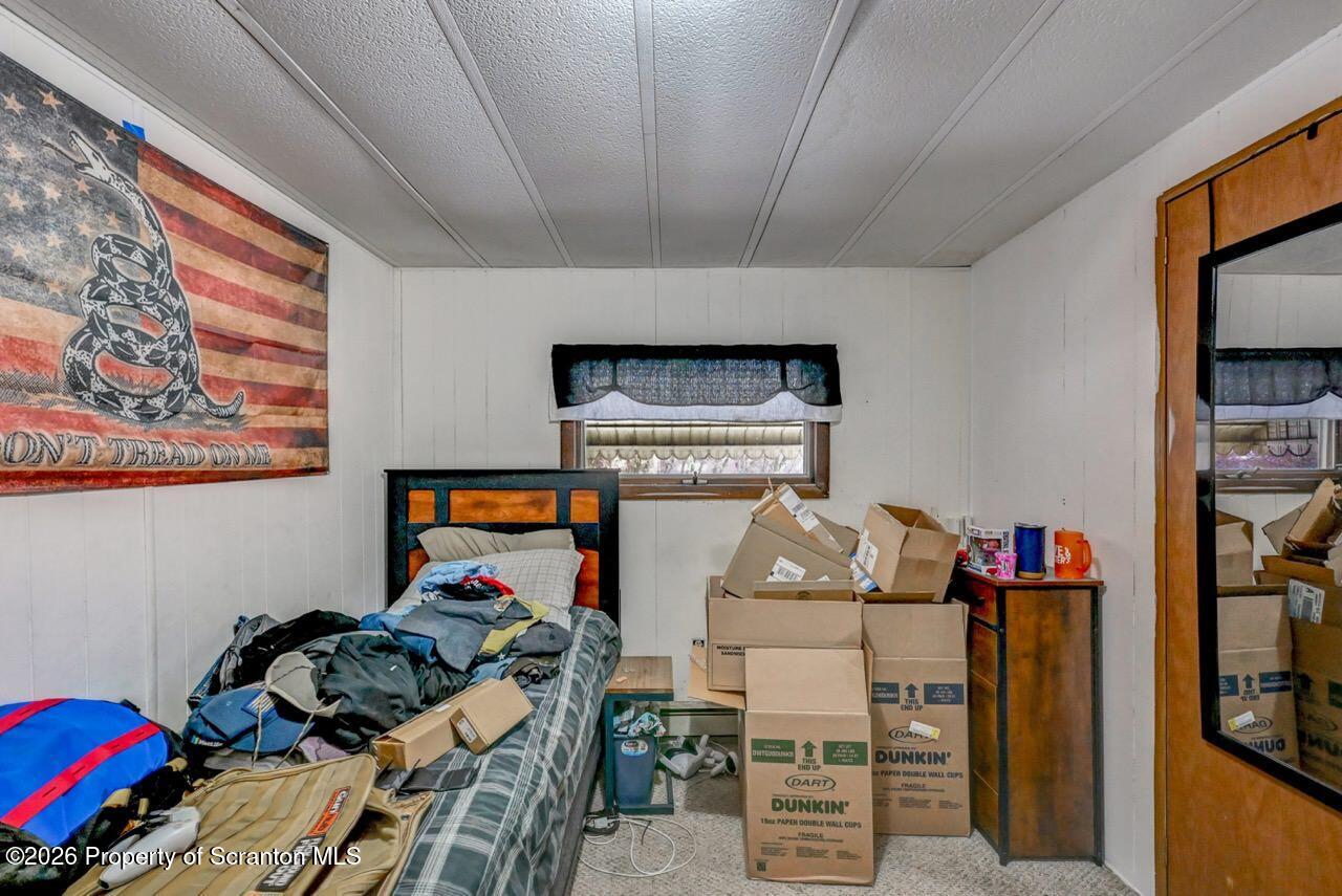191 Poplar Street Archbald, PA 18403 - Photo 26 of 35 a room with furniture and a flat screen tv