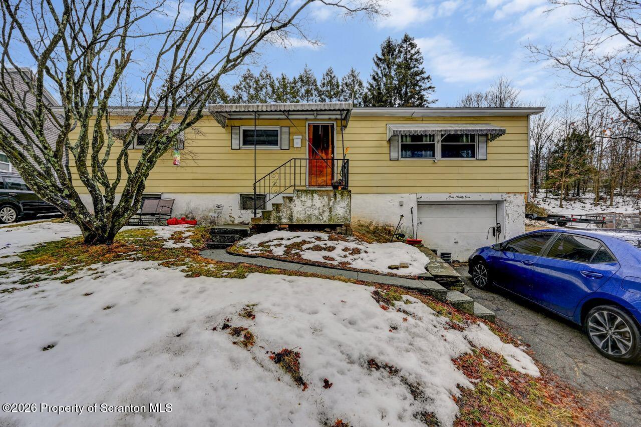 191 Poplar Street Archbald, PA 18403 - Photo 5 of 35 a front view of a house with a yard