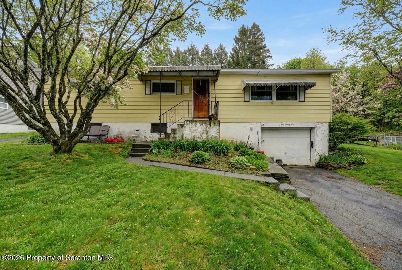 191 Poplar Street Archbald, PA 18403 - Photo 6 of 35 a front view of house with yard and green space