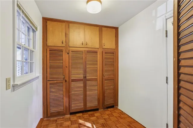a view of a bedroom with a window
