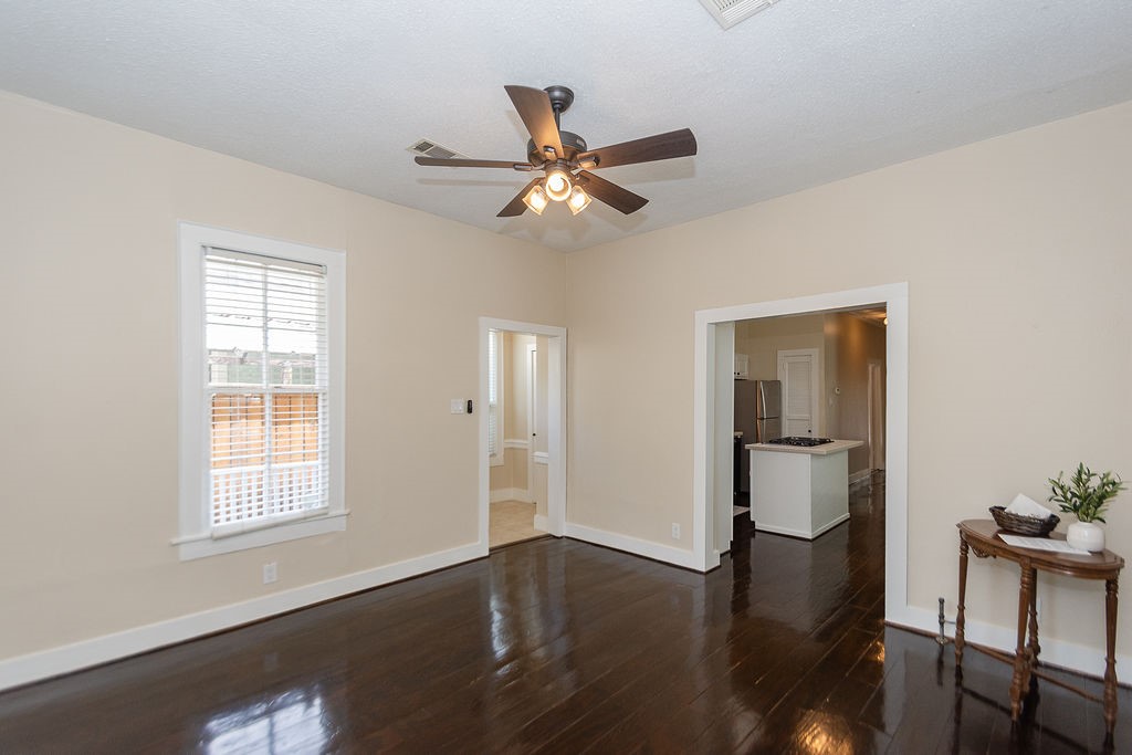 3909 Barnes Street Houston, TX 77007 - Photo 4 of 22 Beautiful living room with redone floors and fresh paint