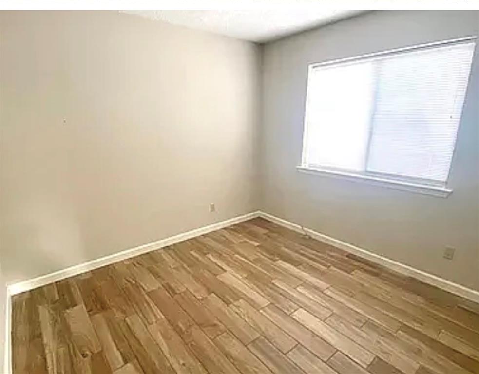 2614 Timberview Circle Corinth, TX 76210 - Photo 18 of 18 an empty room with a window