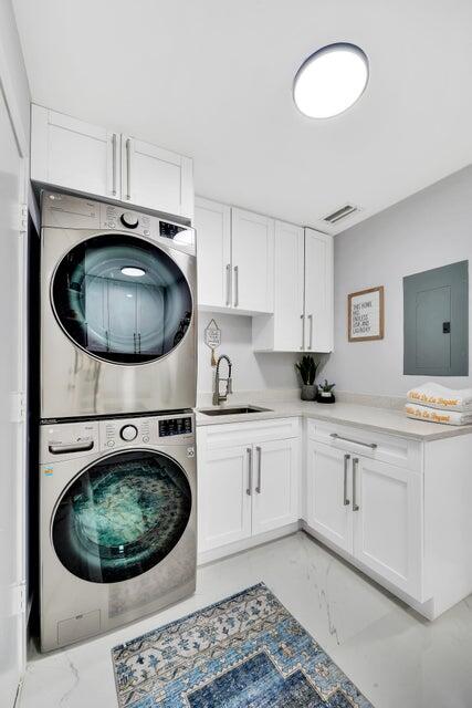 4526 St Andrews Drive Boynton Beach, FL 33436 - Photo 16 of 17 a kitchen with a stove and a sink