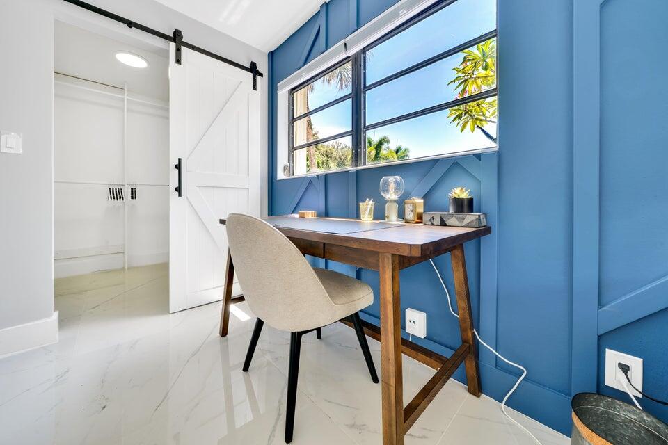 4526 St Andrews Drive Boynton Beach, FL 33436 - Photo 8 of 17 a view of a dining room with furniture and a window