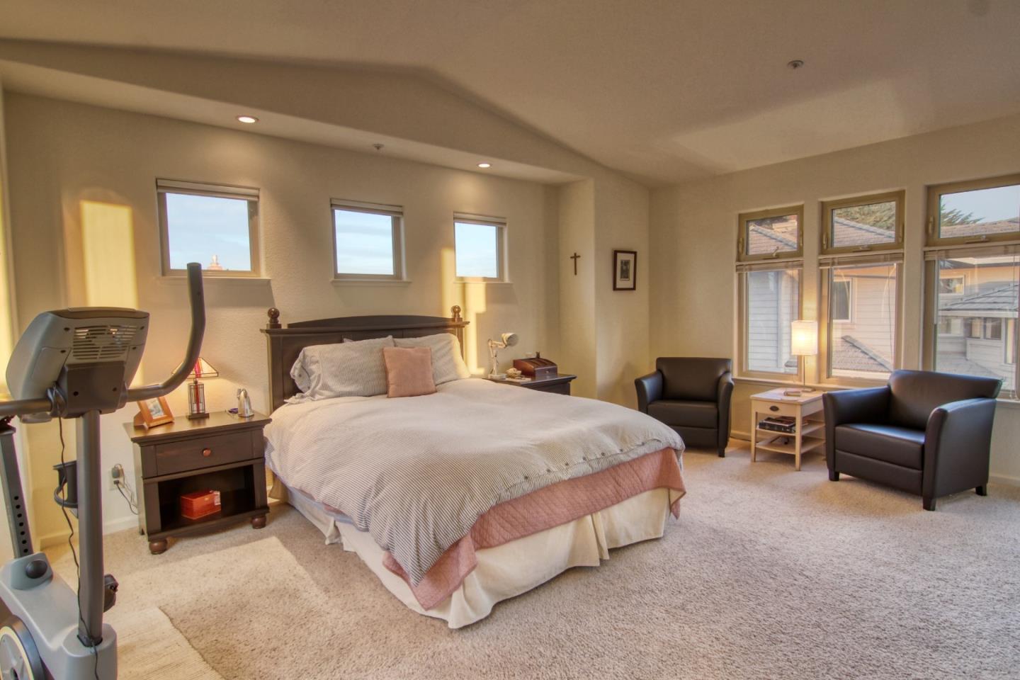 146 Katerina Lane Marina, CA 93933 - Photo 11 of 23 a spacious bedroom with a bed and furniture