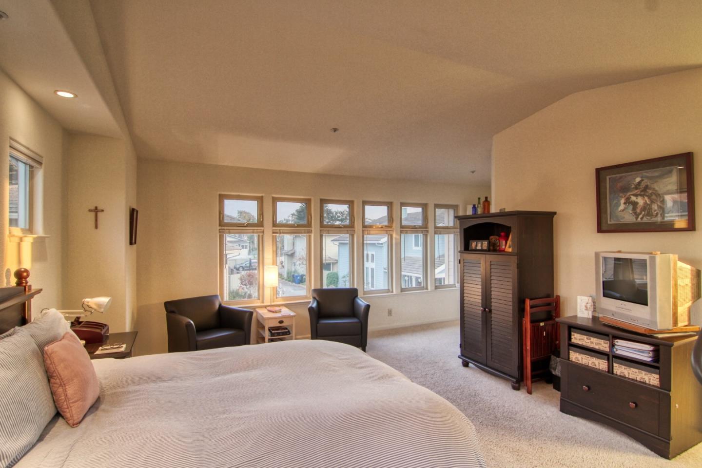 146 Katerina Lane Marina, CA 93933 - Photo 13 of 23 a bedroom with a bed a couch and dresser